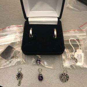 Hoop earrings with three sets of charms